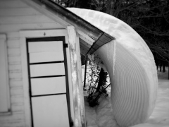snow-sliding-off-roof